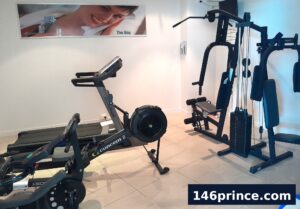 Ground floor gym with weight machine and cycle